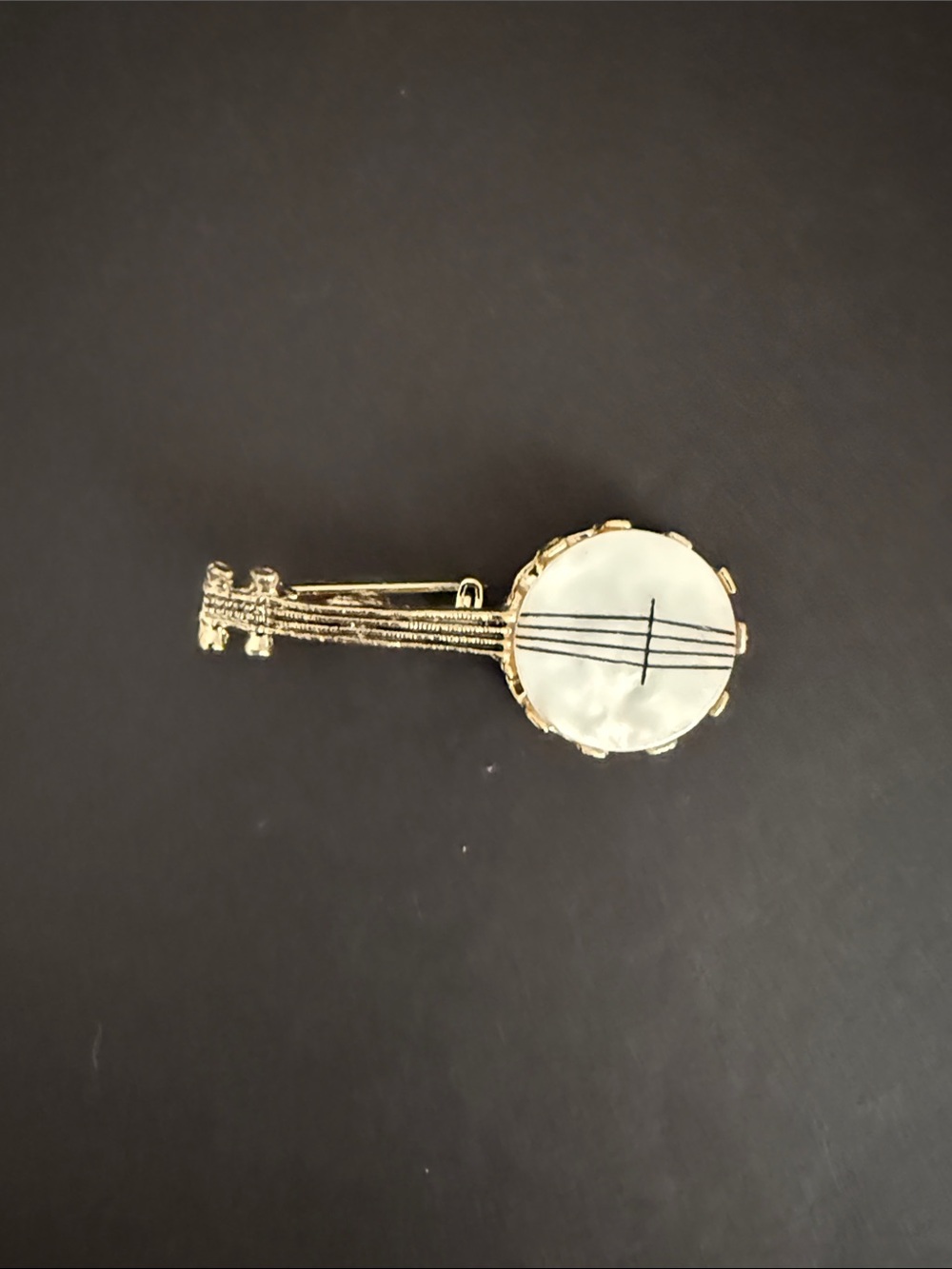 vintage banjo figural brooch. unbranded